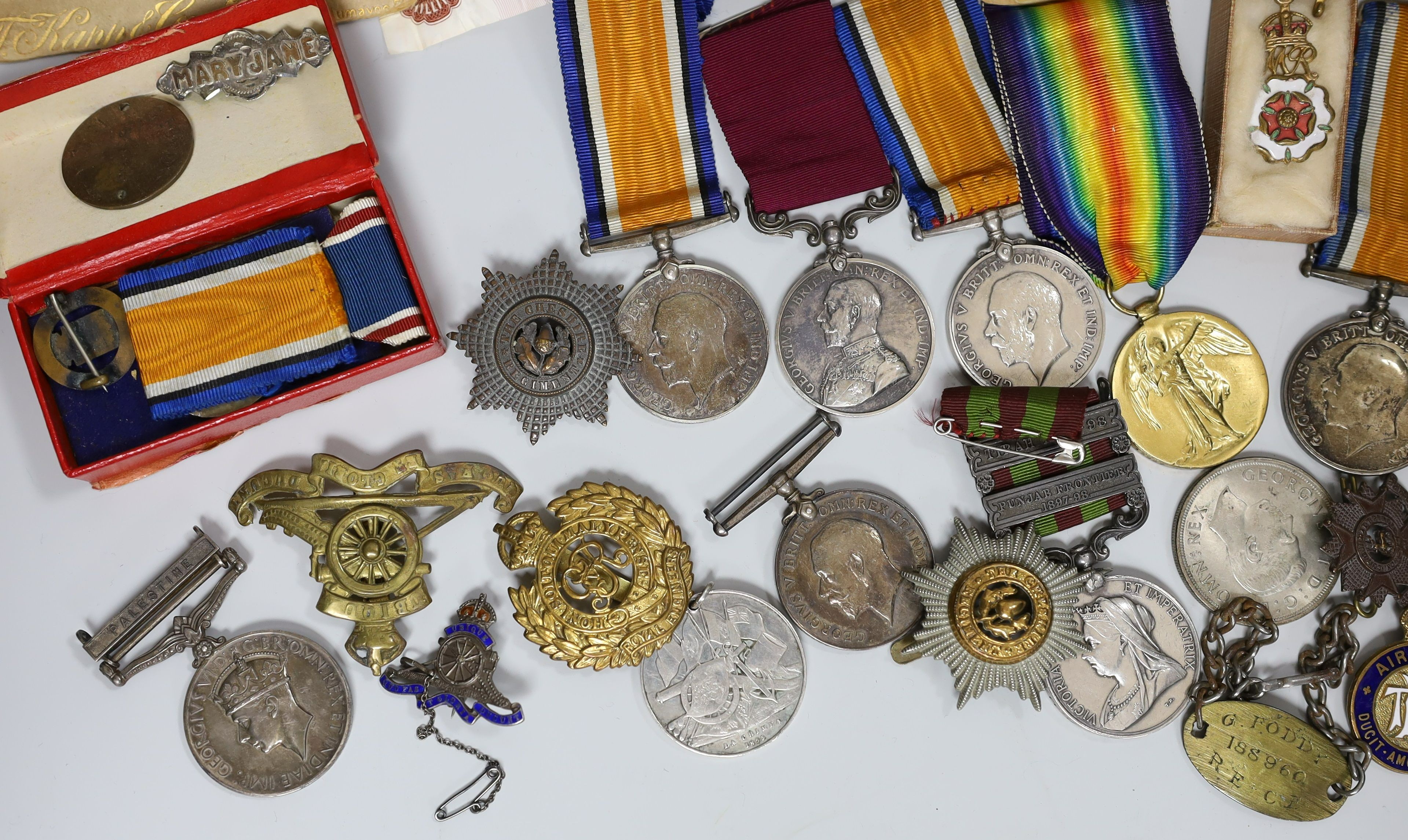 An India campaign medal and a long service and good conduct medal both awarded to 4838 PTE W.J. MORRIS 2D BN RYL SUSS REGT, a British war medal awarded to 34910 PTE. W. T. MORRIS. BEDF. R. a Palestine general service med